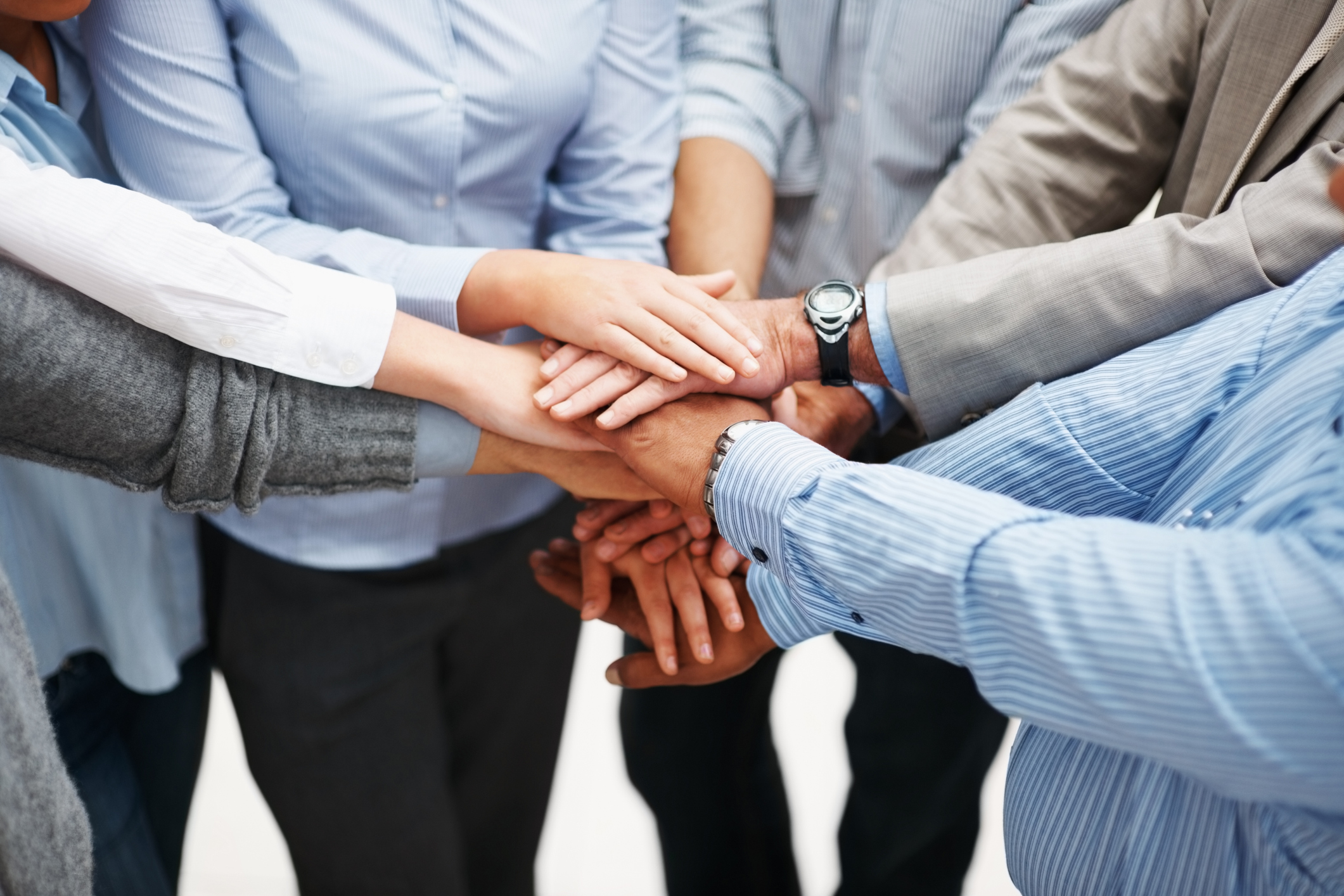 Closeup of a business people with hands together