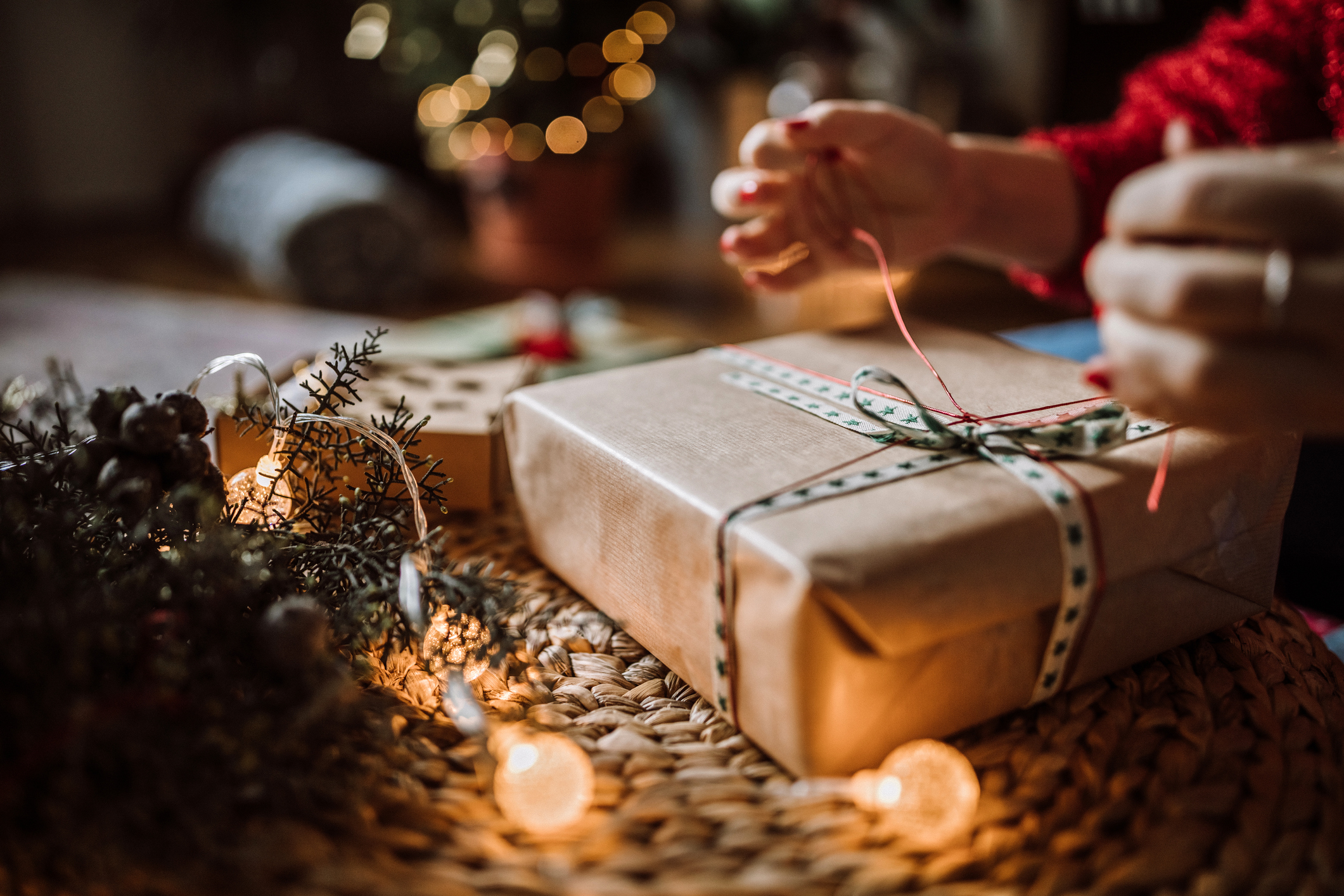 Woman Wrapping Christmas Gifts Woman Wrapping Christmas Gifts